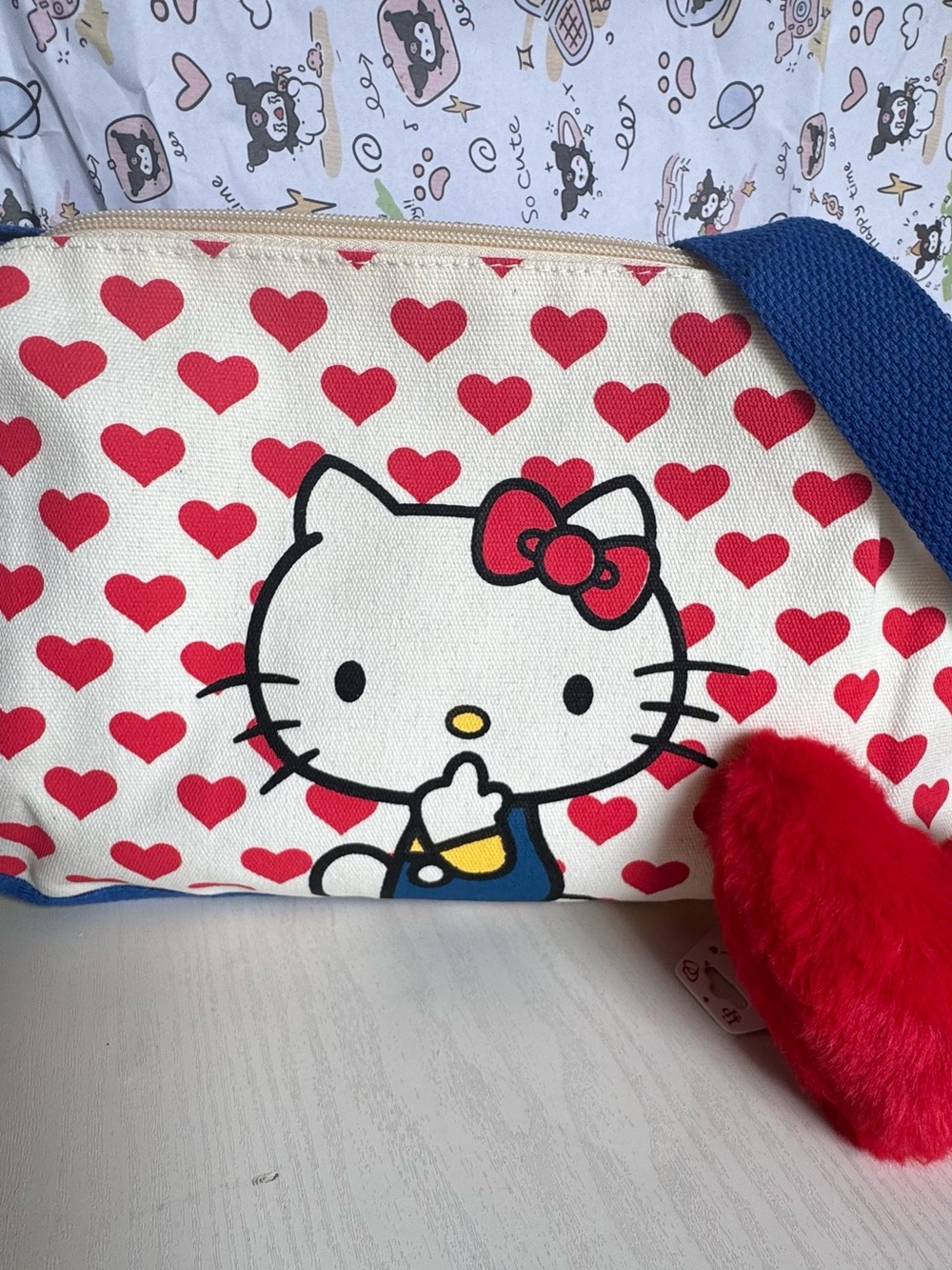 Hello Kitty Canvas Crossbody Bag in Red, Blue, Cream with Plush Red Heart Charm - Picture 7 of 8